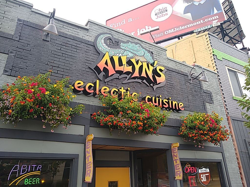 storefront sign for Ally's cuisine