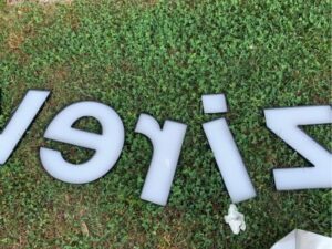 sign letters in grass