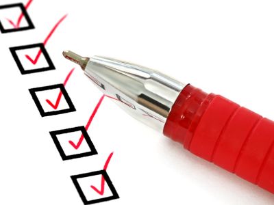 checklist with red pen
